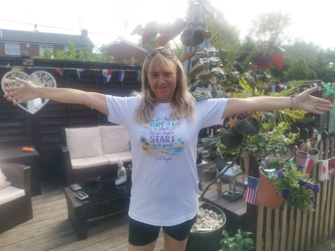 standing in the garden wearing a motivational T shirt