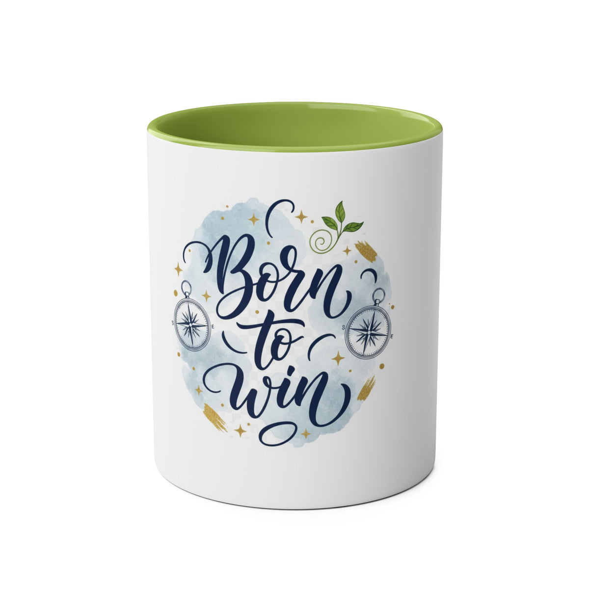 A white ceramic mug with a light green interior, featuring a graphic design on the front that reads 'Born to Win' in dark blue script over a light blue watercolor splash, decorated with compasses, stars, and small green leaves.