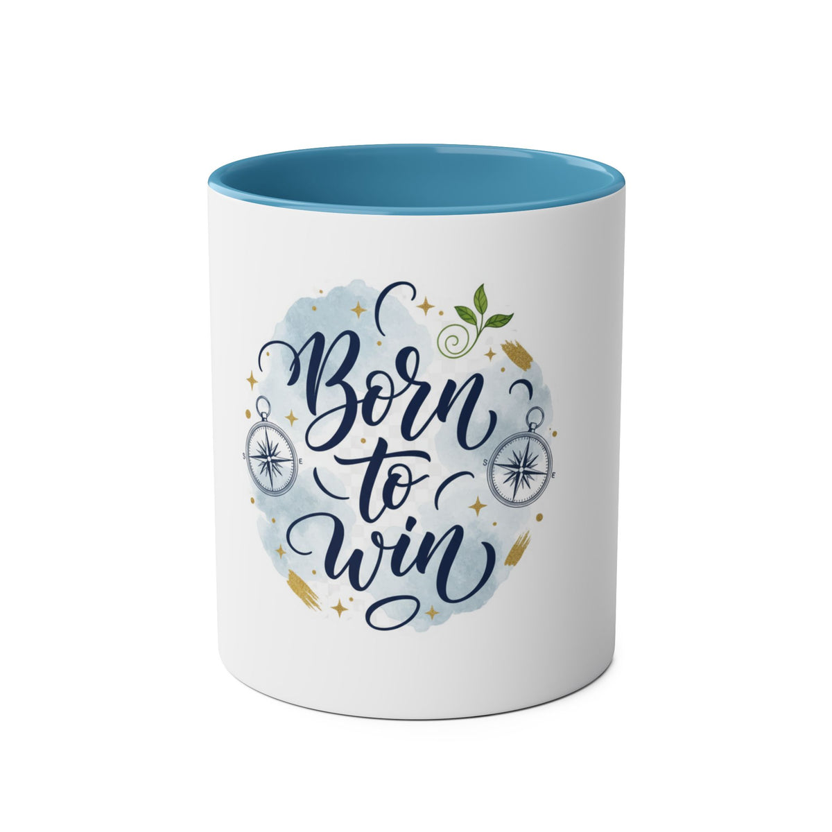 A white ceramic mug with a contrasting blue interior, featuring a graphic design on the front that reads 'Born to Win' in dark blue script over a light blue watercolor splash, decorated with gold stars, compasses, and a small green leaf.
