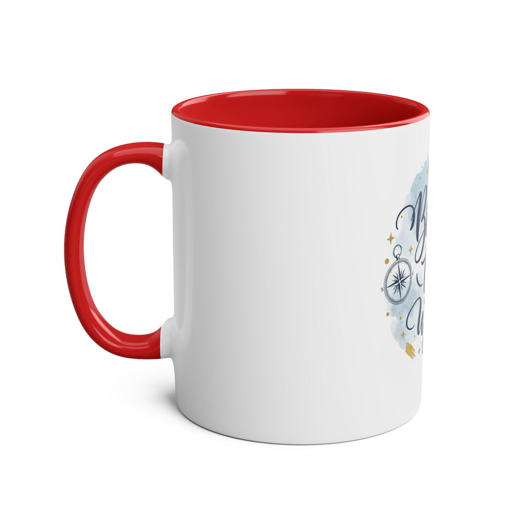 A white ceramic mug with a red interior and red handle, featuring a partial blue and gold graphic design on the side, shown on a plain white background.